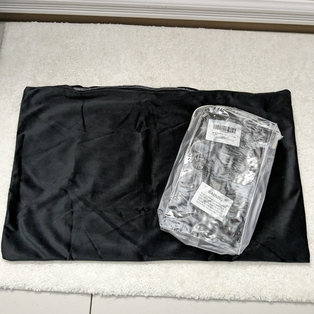 NIB.  One black zippered pillow cover that's super soft and smooth to touch.